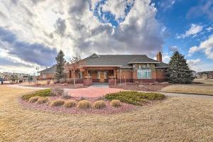 a house with a landscaping in front of it at Modern Aurora Getaway 22 Mi to Downtown Denver in Watkins