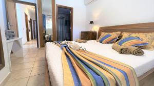 Łóżko lub łóżka w pokoju w obiekcie Chalet Amelie