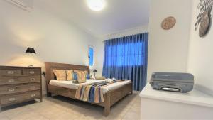 Łóżko lub łóżka w pokoju w obiekcie Chalet Amelie