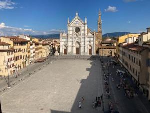 a large square in front of a large church at ATTICO IN PIAZZA SANTA CROCE in Florence