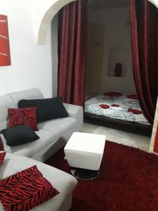 A bed or beds in a room at Buze Rodriguez Suite