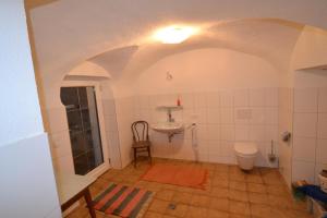 a bathroom with a sink and a toilet at Landhaus Waldesruh in Oetz +34 photos