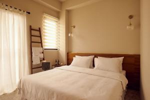 Sunlight Homestayにあるベッド