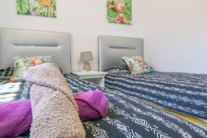 Posteľ alebo postele v izbe v ubytovaní Casa Lilly-Rose, a beautiful 3 bedroom detached villa a short walk to the Villamartin Plaza & Golf course