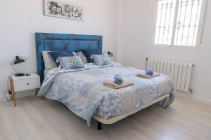 Posteľ alebo postele v izbe v ubytovaní Casa Lilly-Rose, a beautiful 3 bedroom detached villa a short walk to the Villamartin Plaza & Golf course