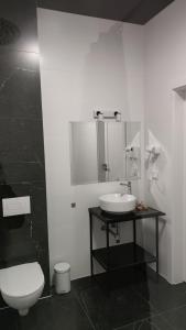 Kúpeľňa v ubytovaní Hotel ANTARES