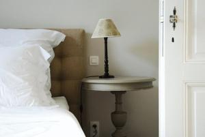 Postel nebo postele na pokoji v ubytování B&B Villa des Roses + 1 fotografie