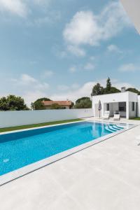 a swimming pool in the backyard of a villa at Chill House in Santa Barbara