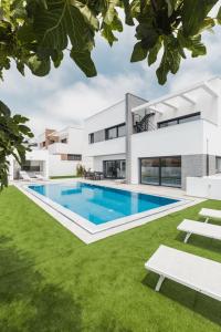 an image of a house with a swimming pool at Chill House in Santa Barbara