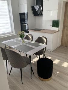 Kuchyňa alebo kuchynka v ubytovaní D&V Apartman