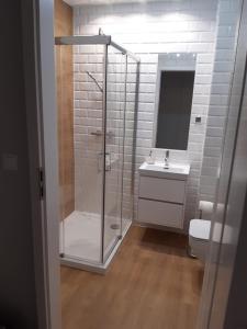 Ένα μπάνιο στο Apartament Nadmorskie Tarasy z widokiem na morze