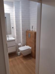 Salle de bains dans l'établissement Apartament Nadmorskie Tarasy z widokiem na morze