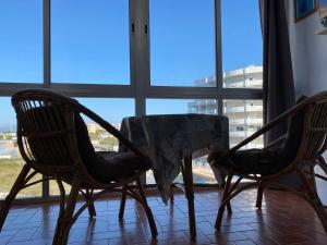 Posezení v ubytování VIDABRAVA Roses Nautic, estudio loft a 300 m de la playa,vistas espectaculares