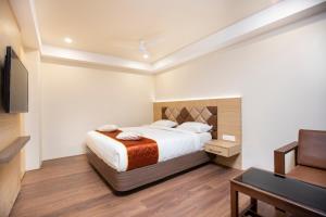 Postel nebo postele na pokoji v ubytování Lee-Benz ARK HOTEL + 37 fotografií