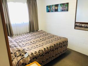 Postel nebo postele na pokoji v ubytování New Haven Motel