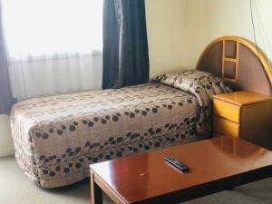 Postel nebo postele na pokoji v ubytování New Haven Motel