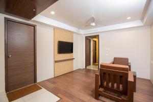 TV a/nebo společenská místnost v ubytování Lee-Benz ARK HOTEL