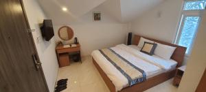 Postel nebo postele na pokoji v ubytování ALEX HOTEL Peony
