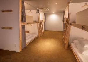 WPÜ HOTEL HAKONE客房内的一张或多张床位