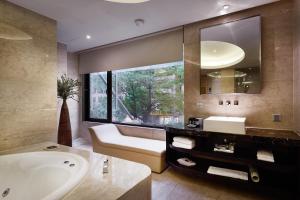 Bilik mandi di The Tango Hotel Taipei XinYi