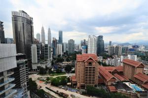 a view of a city with tall buildings at Dorsett Residences Bukit Bintang @Artez Maison in Kuala Lumpur