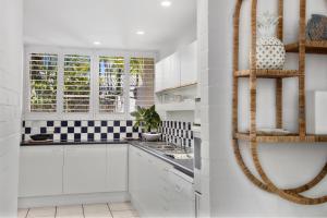 A kitchen or kitchenette at 1/67 Noosa Parade