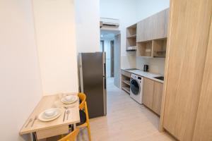 Η κουζίνα ή μικρή κουζίνα στο Cantonment Serviced Apartment