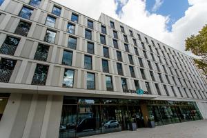 a rendering of the front of a building at Motel One Köln-Neumarkt in Cologne