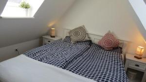 Postel nebo postele na pokoji v ubytování Südspitze 02