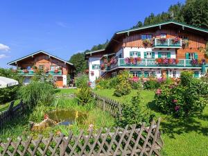 a large house with a garden in front of it at Haus Michinglehen in Marktschellenberg