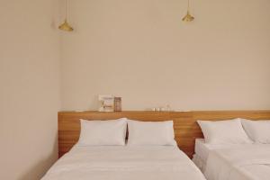 Sunlight Homestayにあるベッド