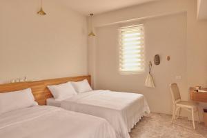 Sunlight Homestayにあるベッド