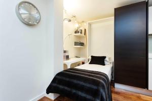 Кровать или кровати в номере Veeve - Brilliant Barbican