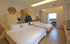 Ένα ή περισσότερα κρεβάτια σε δωμάτιο στο Sunny Stream B & B