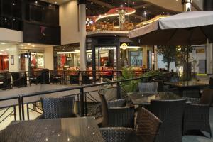 Restoran või mõni muu söögikoht majutusasutuses Tucuman Center Suites&Business