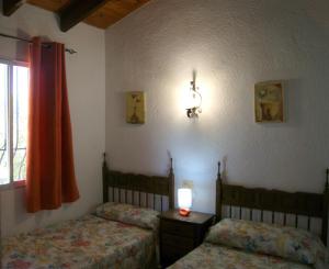 A bed or beds in a room at Villa Efaistos