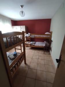A bed or beds in a room at Casa Rural El Olmo