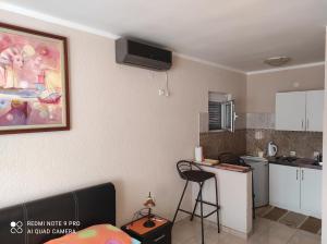 Kuchyň nebo kuchyňský kout v ubytování Apartments Anne