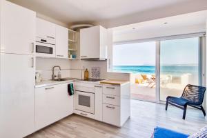 Η κουζίνα ή μικρή κουζίνα στο Appartement - Les Pieds Dans L'Eau