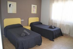 Postel nebo postele na pokoji v ubytování 0001 Villa Mahon