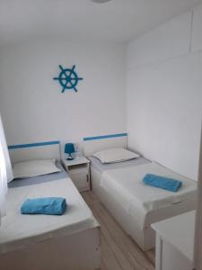 Postel nebo postele na pokoji v ubytování Summer House Hacienda, Pag - Miškovići