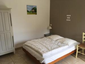 Postel nebo postele na pokoji v ubytování Le Mas des 3 Anes