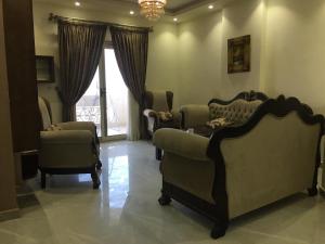 Posezení v ubytování Ramco For Furnished Apartments And Accommodation Compound Leila