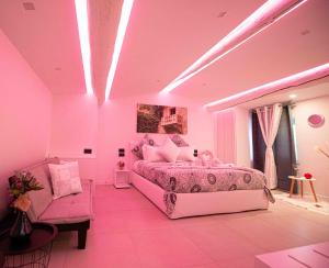 Postel nebo postele na pokoji v ubytování HOME CARPEDIEM