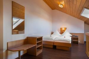 Postel nebo postele na pokoji v ubytování acora Karlsruhe Zentrum Living the City - Apartments + 34 fotografií