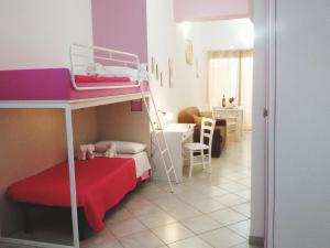A bed or beds in a room at Case Vacanza da Marco&Mary