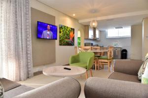 Et opholdsområde på La Lucia Sands Beach Resort