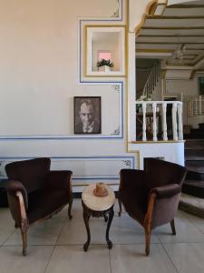 a living room with two chairs and a table at Oasis Hotel Edirne in Edirne