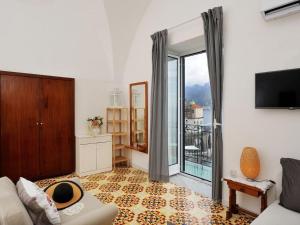 Postel nebo postele na pokoji v ubytování Villa Torricella Amalfi + 61 fotografií
