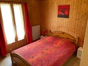 Letto o letti in una camera di Hôtel du Gd-St-Bernard